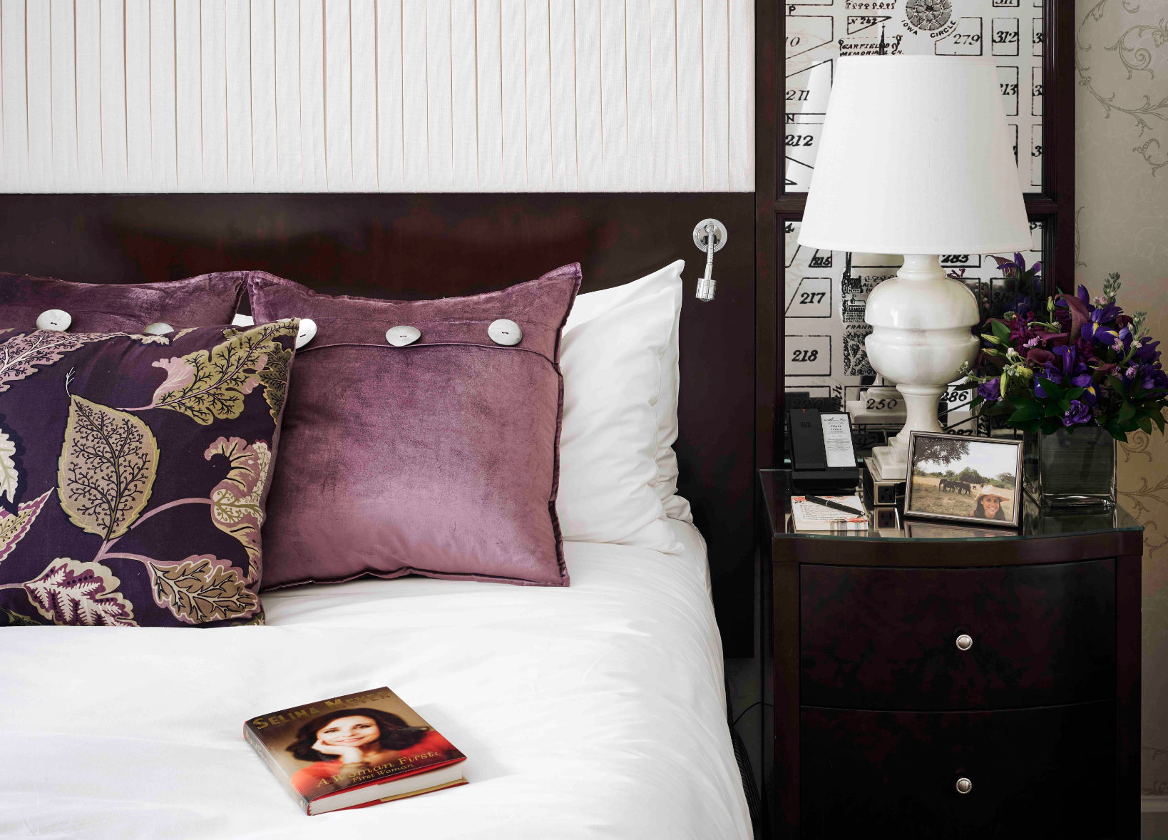 image Elegant bedside retreat, with rich textures and warm lighting for a cozy and refined ambiance.