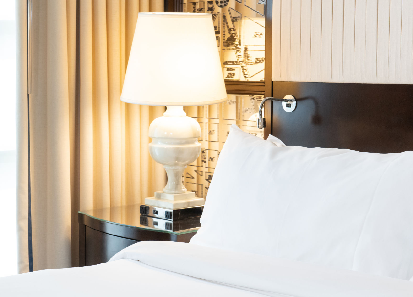 image Soft lighting and luxurious bedding, where elegance meets total comfort for a serene stay.
