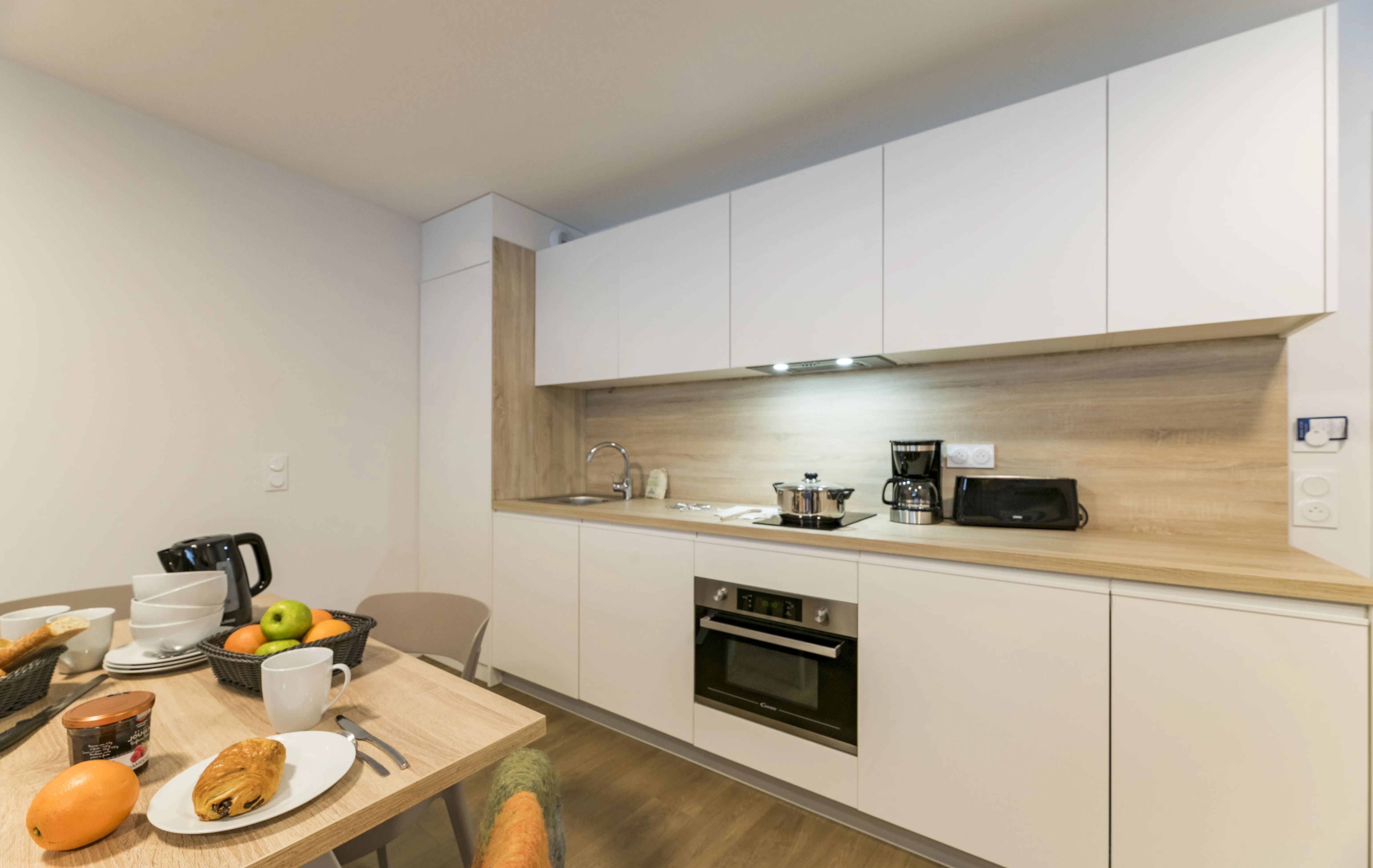 image Enjoy culinary delights in a stylish kitchen, well-equipped for romantic meals made easy after exhilarating days on the slopes.