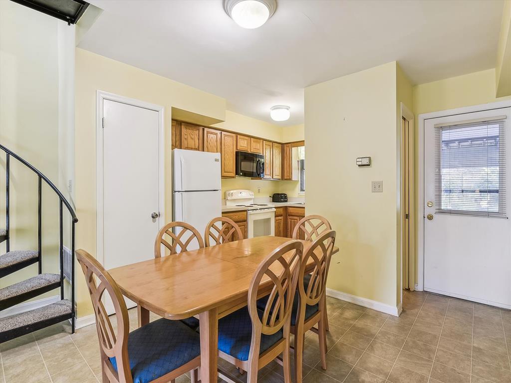 image The fully equipped kitchen, featuring modern appliances, makes meal preparation a breeze, inviting friends and family to gather for memorable meals.
