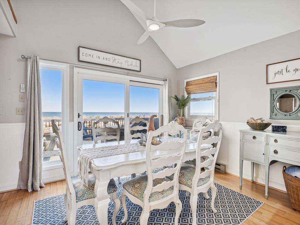 image Bright and airy dining area with panoramic ocean views.