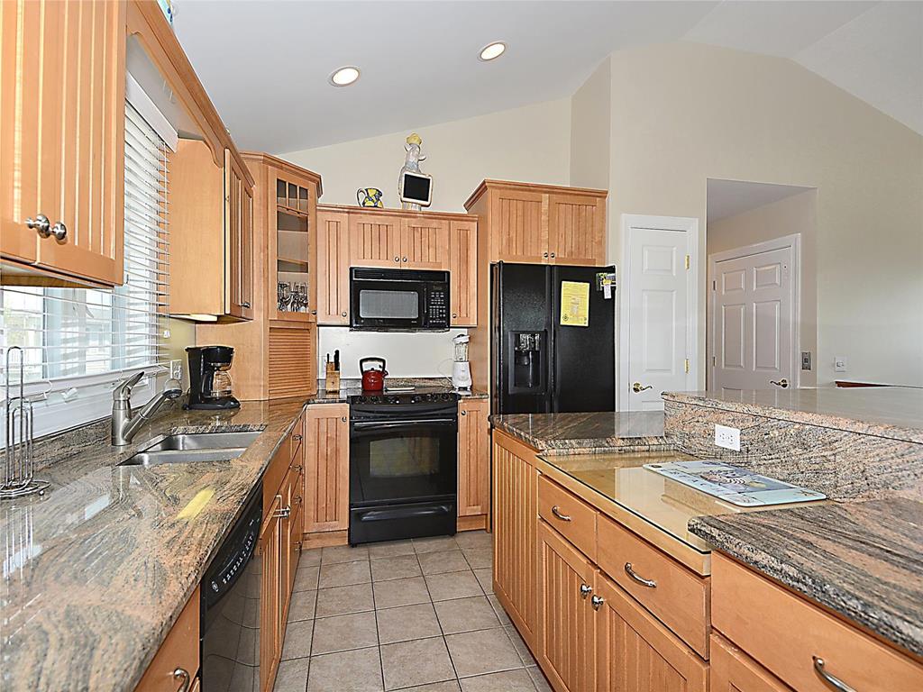 image Experience culinary delights in this beautifully designed kitchen, featuring high-end finishes and open space that flows seamlessly into the living areas, perfect for entertaining.