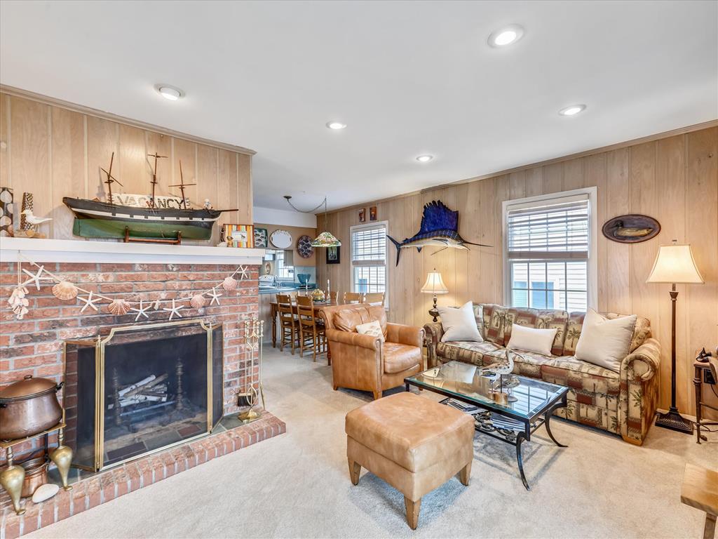image Another angle of the spacious living area, showcasing its warm wood paneling and inviting atmosphere.