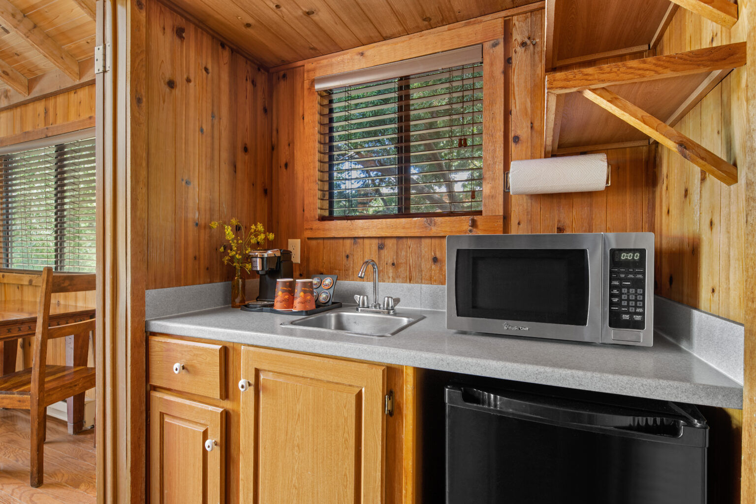 image Enjoy the convenience of a well-equipped kitchenette, perfect for preparing meals while embracing the simplicity of nature.