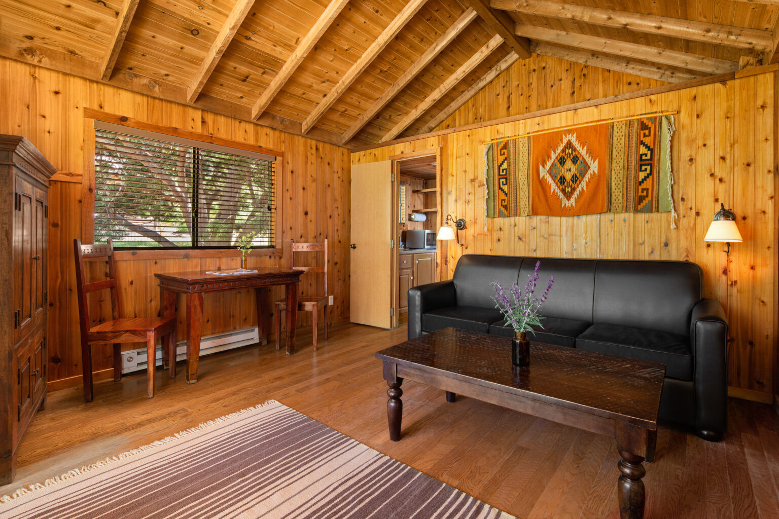 image Unwind in a beautifully designed living space, where warm wood tones and natural light create a peaceful and inviting atmosphere.
