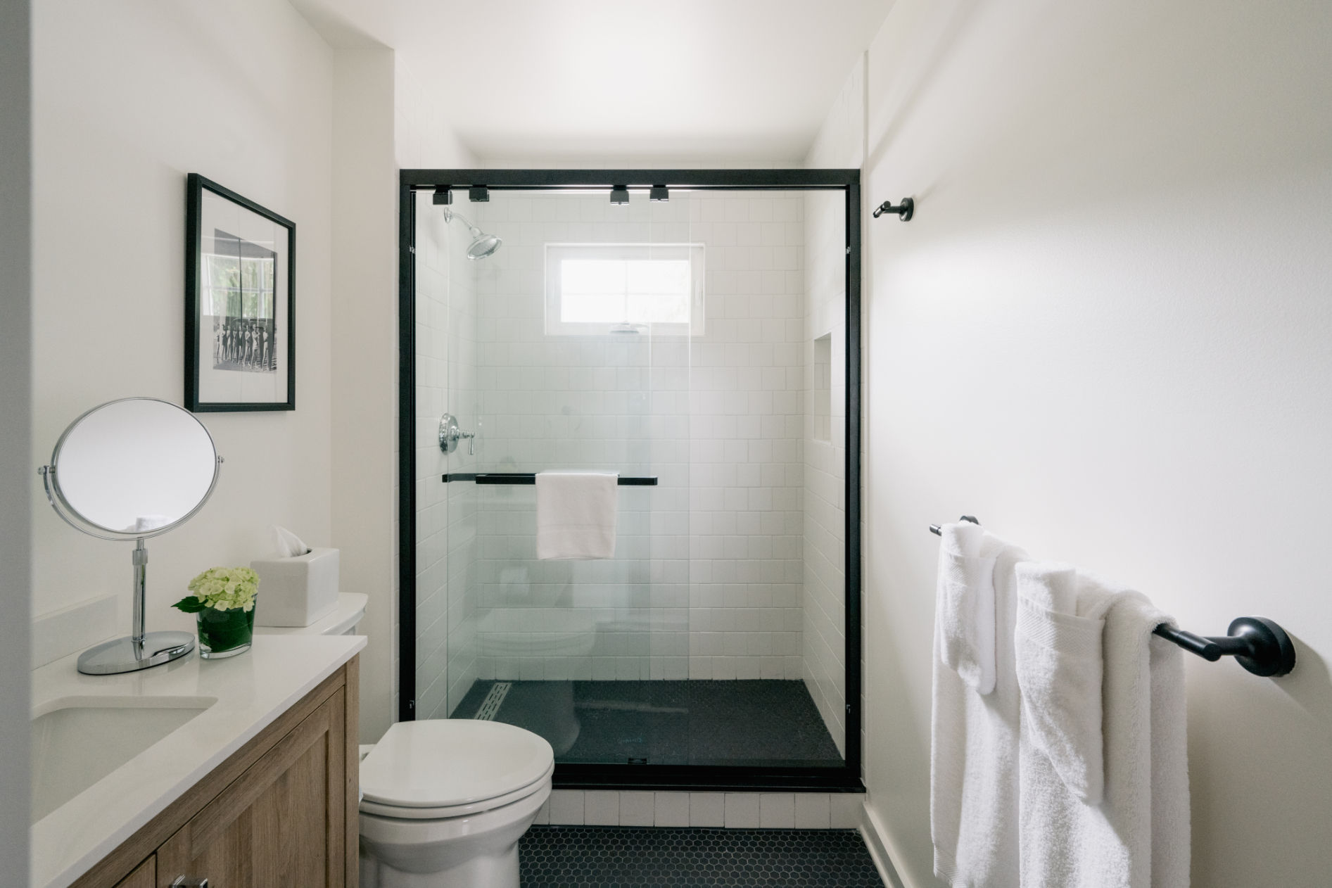 image A sleek and modern bathroom with a spacious glass-enclosed shower for a refreshing start to the day.