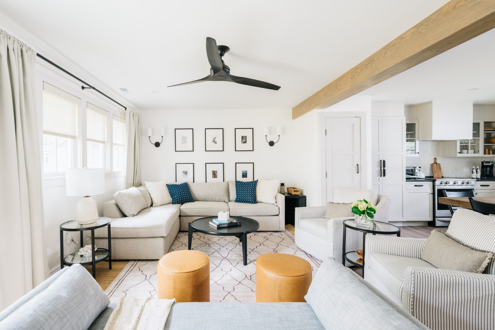image A bright and beautifully designed living space with open-concept flow and cozy seating.
