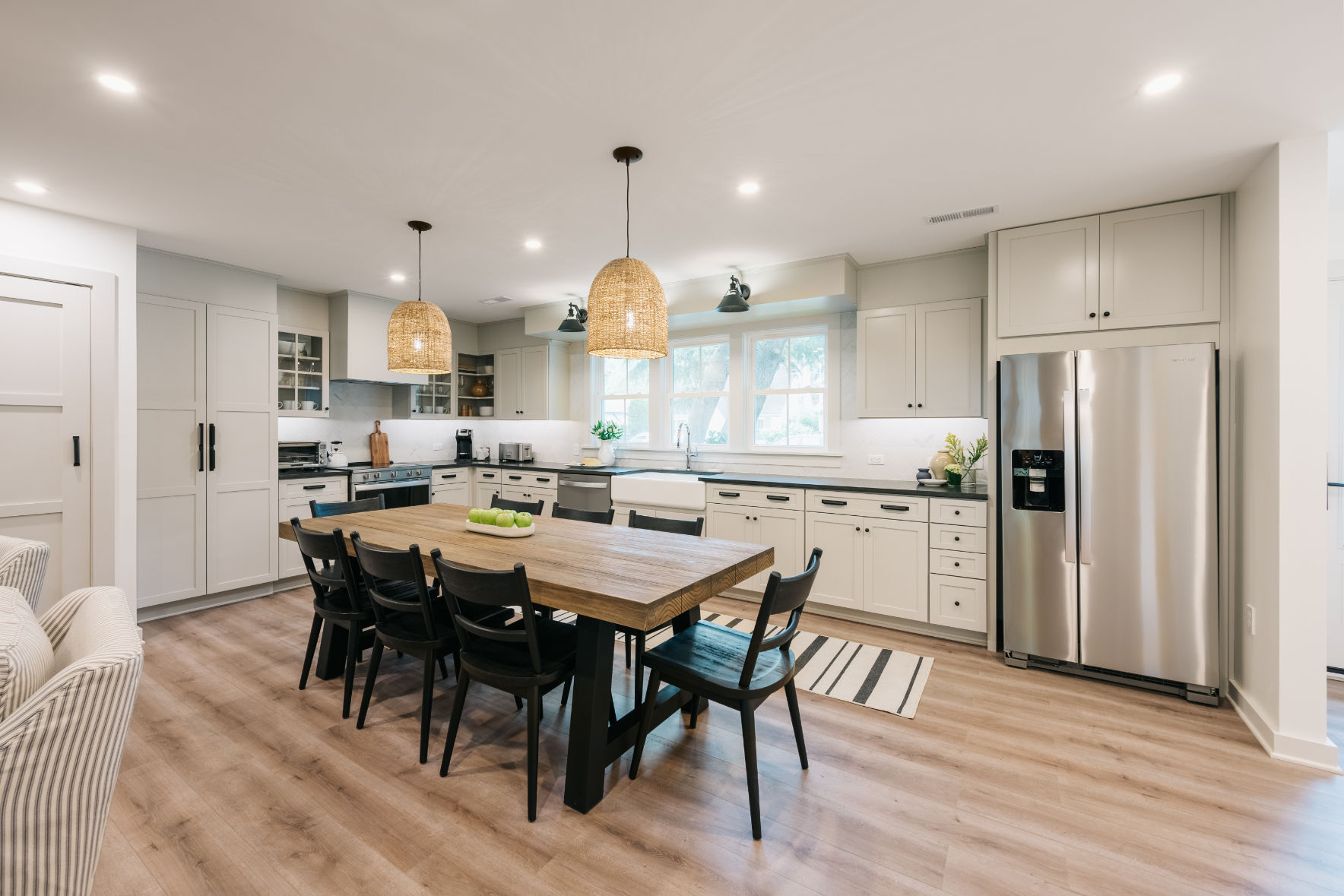 image A stunning open-concept kitchen and dining space, perfect for gathering and entertaining.