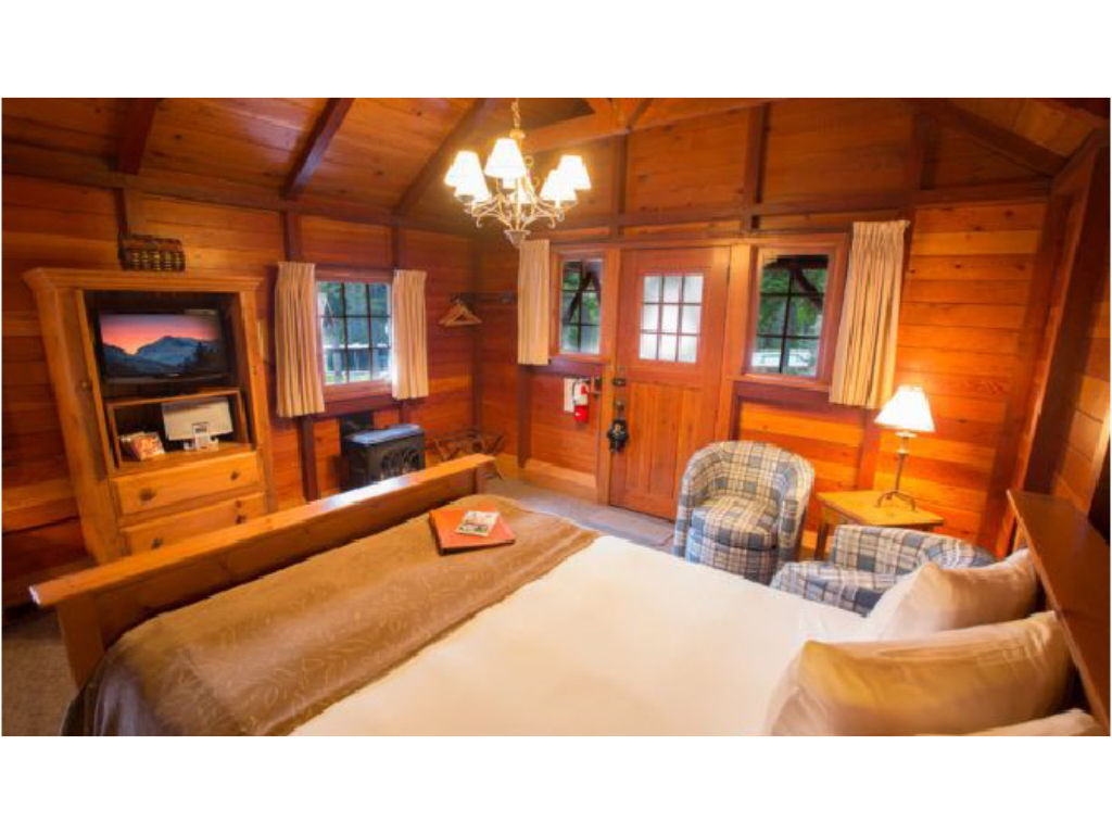 image Rustic wood interiors, soft lighting, and cozy furnishings create a warm and inviting atmosphere.