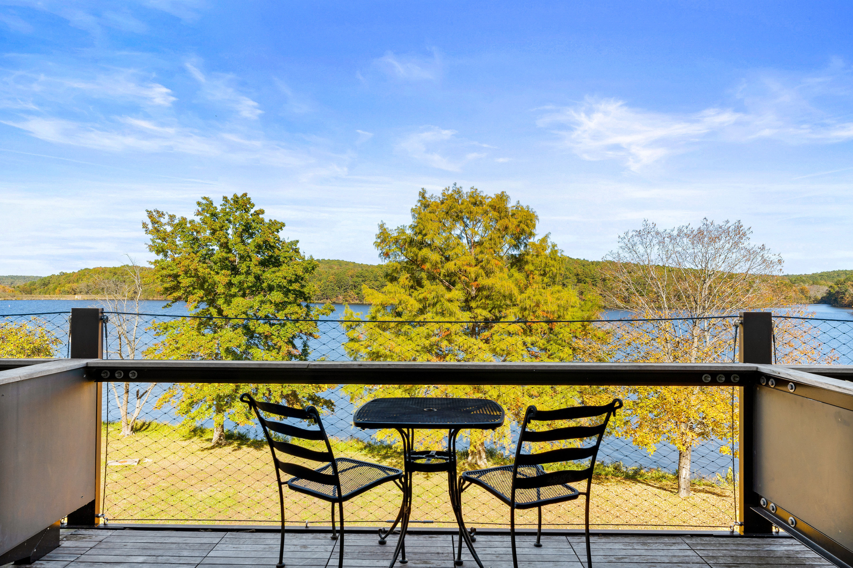 image Step onto your private balcony and enjoy stunning lakefront views while sipping your morning coffee.