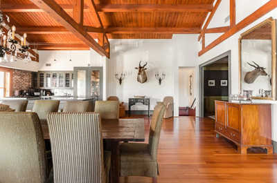 Gather around the dining table under vaulted ceilings, where meals turn into memorable moments.