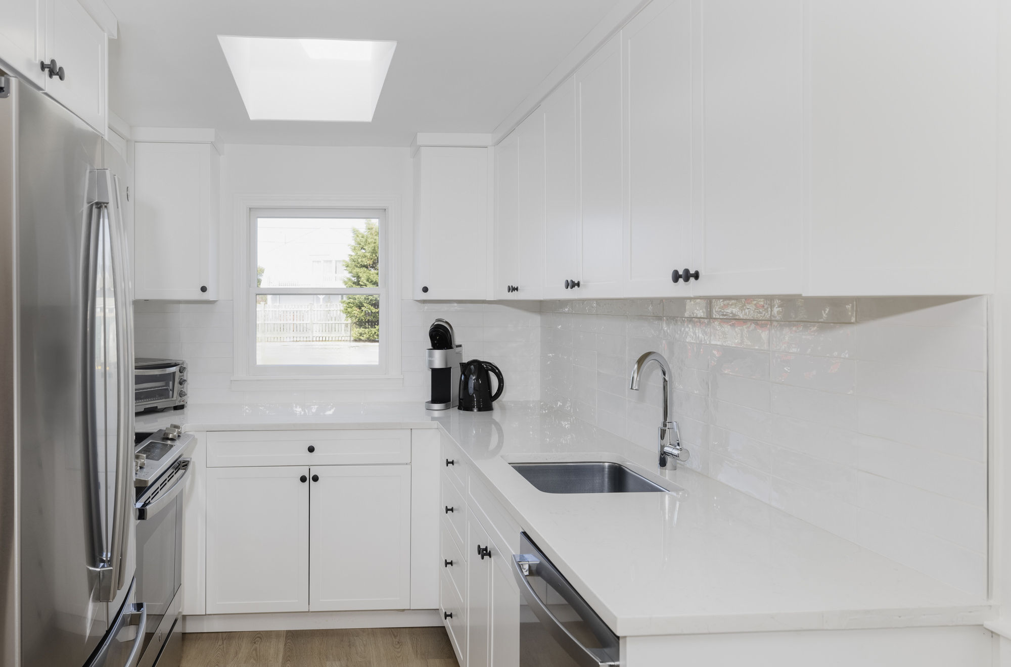 image Prep your favorites in a fresh, sunlit kitchen where coastal simplicity meets everyday ease.
