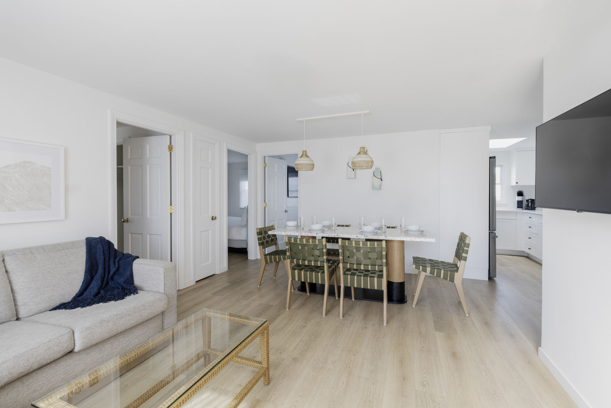 image Gather for slow mornings and seaside evenings in this bright, open space designed for effortless togetherness.