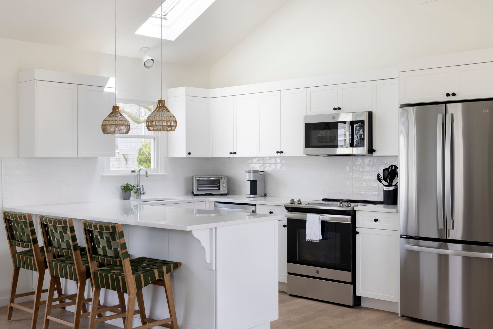 image Whip up easy meals or gather for coffee in a bright, coastal kitchen made for casual connection.
