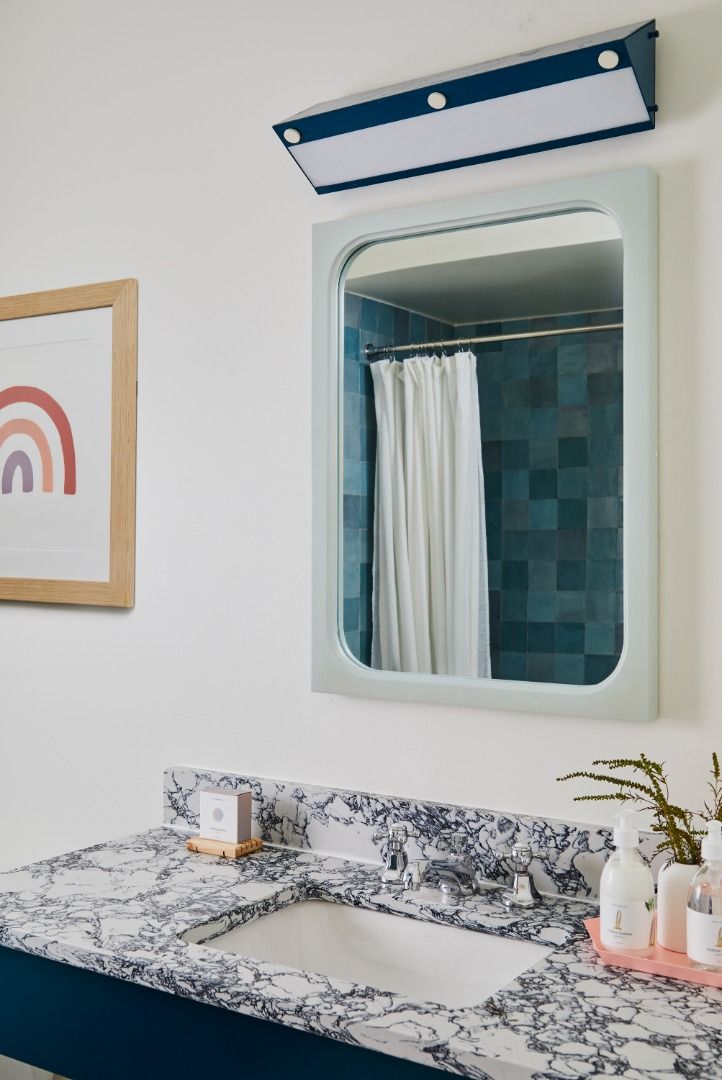 image The accessible bathroom showcases a spacious design with thoughtful amenities tailored for convenience and safety.