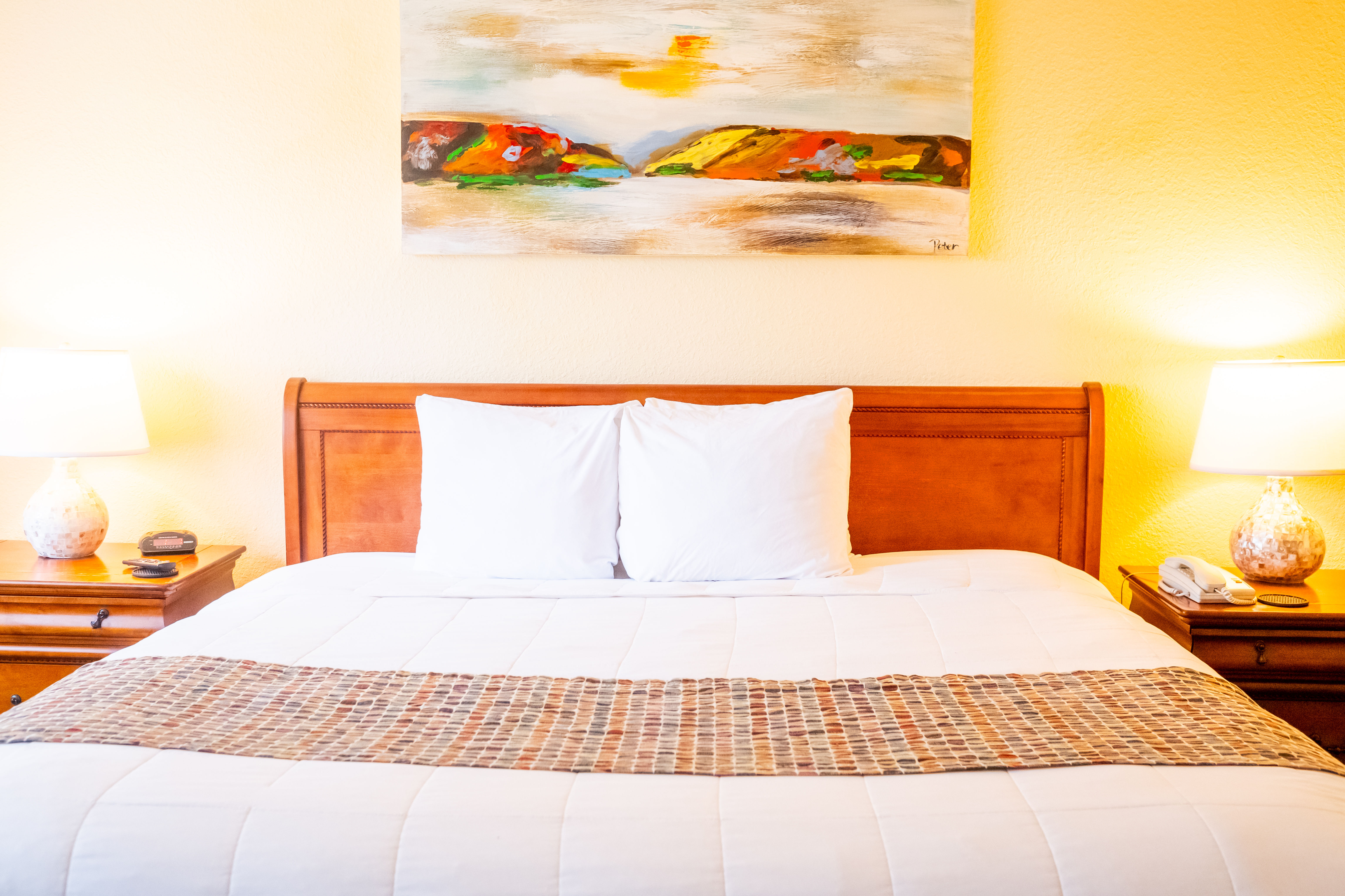 image Experience ultimate comfort in the luxurious king-sized bed, styled with plush linens and serene decor, ensuring a restful night’s sleep.