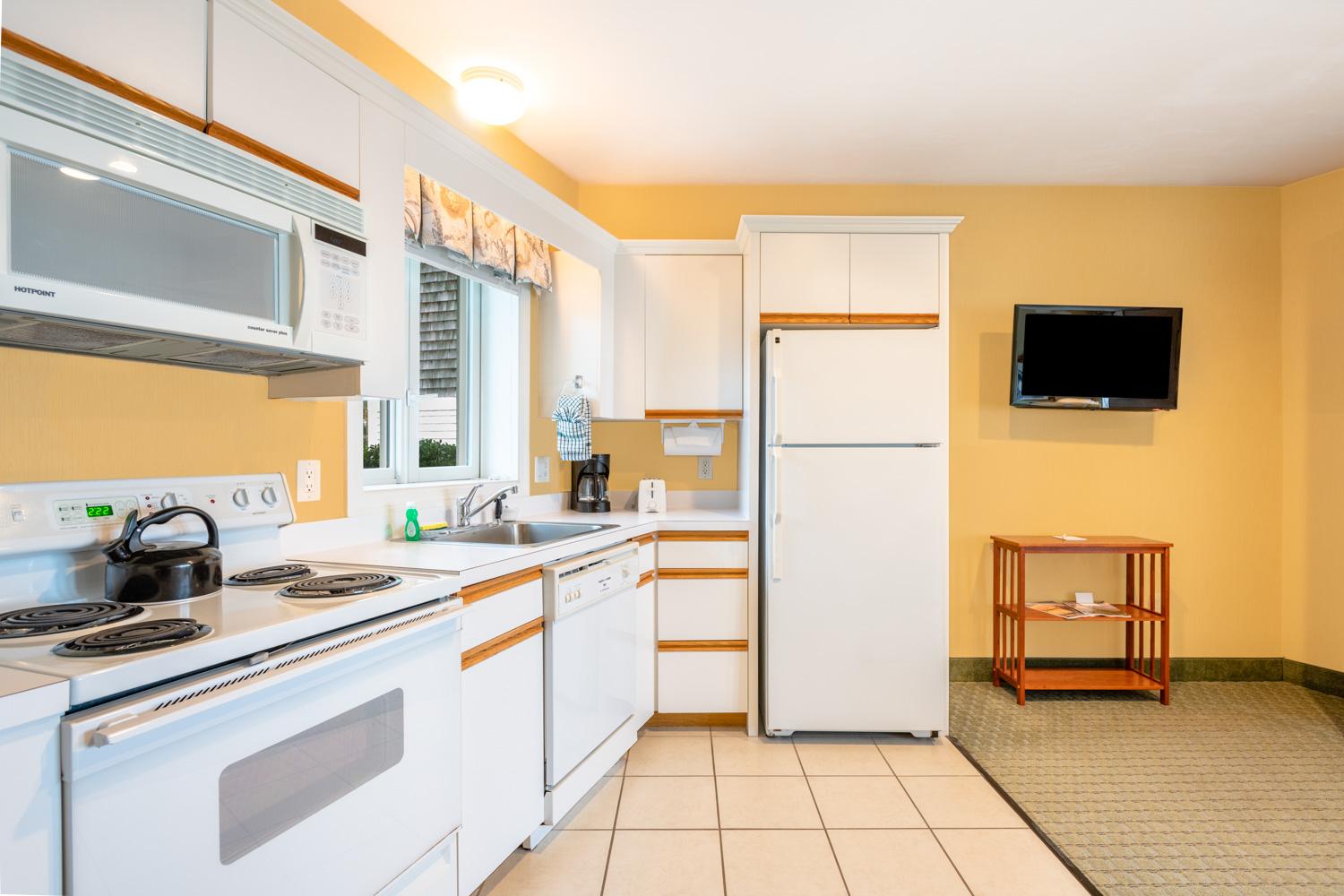 image Whip up casual meals or snacks in a cozy kitchen that keeps your Cape escape feeling effortless and familiar.
