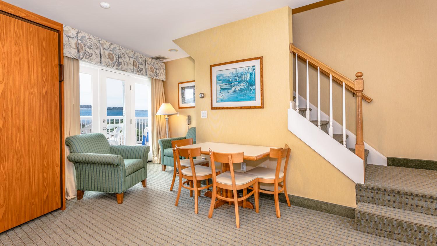 image Gather in a bright, open space where coastal charm meets relaxed comfort—perfect for unwinding together.