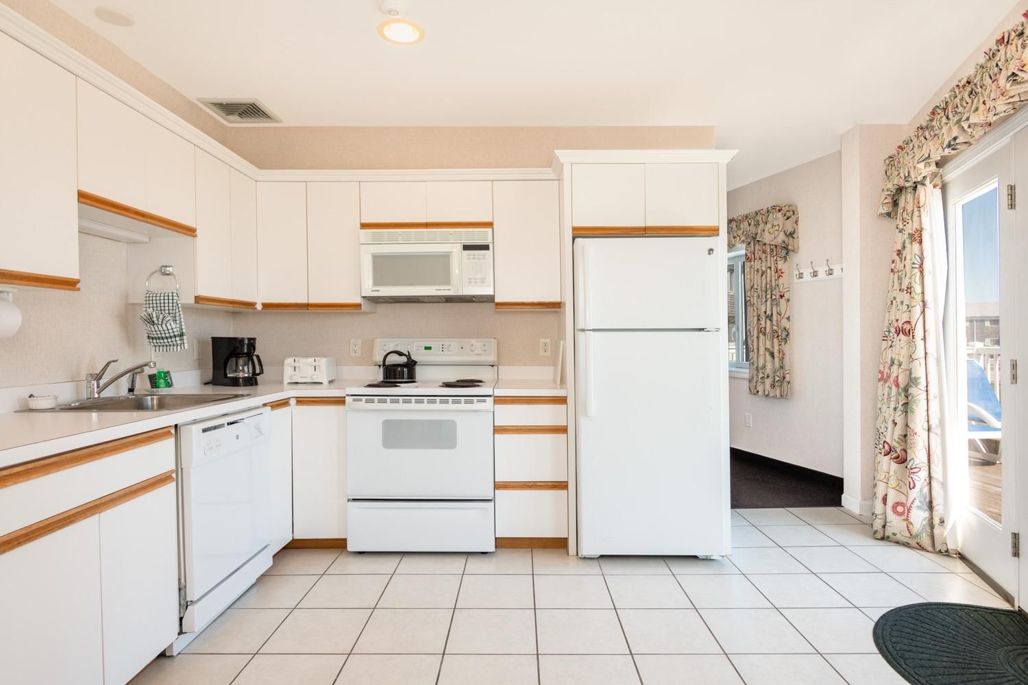 image Keep things simple and relaxed in a bright, functional space where morning coffee flows into easy afternoons.