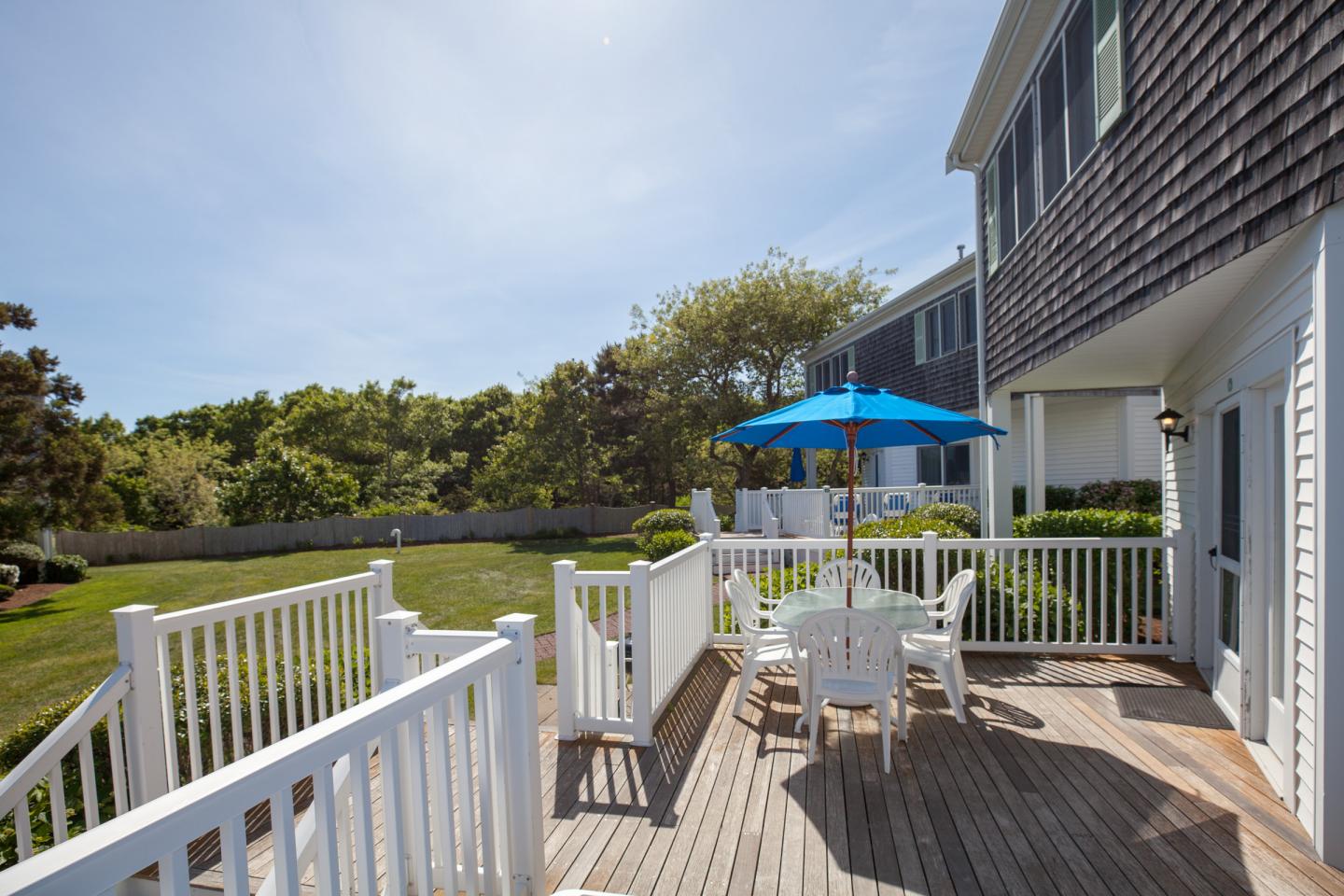 image Bask in coastal sunshine or share a quiet meal under blue skies, just steps from open green space and sea air.