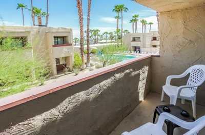 Enjoy the views from the private balcony, complete with chairs for lounging, where you can soak in the sunshine while overlooking the resort grounds.