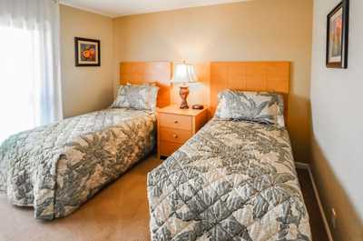 Furnished with two twin beds, this bright room is ideal for family or friends, enhancing your stay with comfort and warmth.
