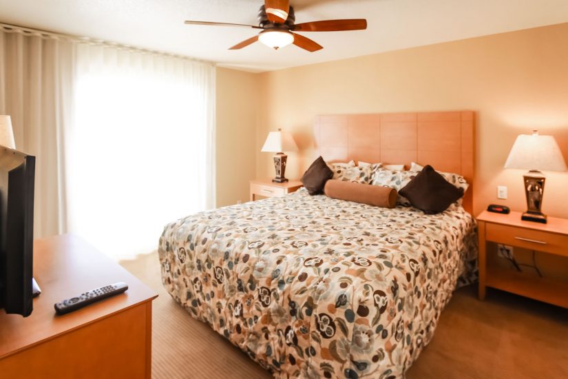 image This cozy bedroom features a king bed and ample natural light, perfect for a peaceful desert retreat at our ADA-compliant two-bedroom condo.