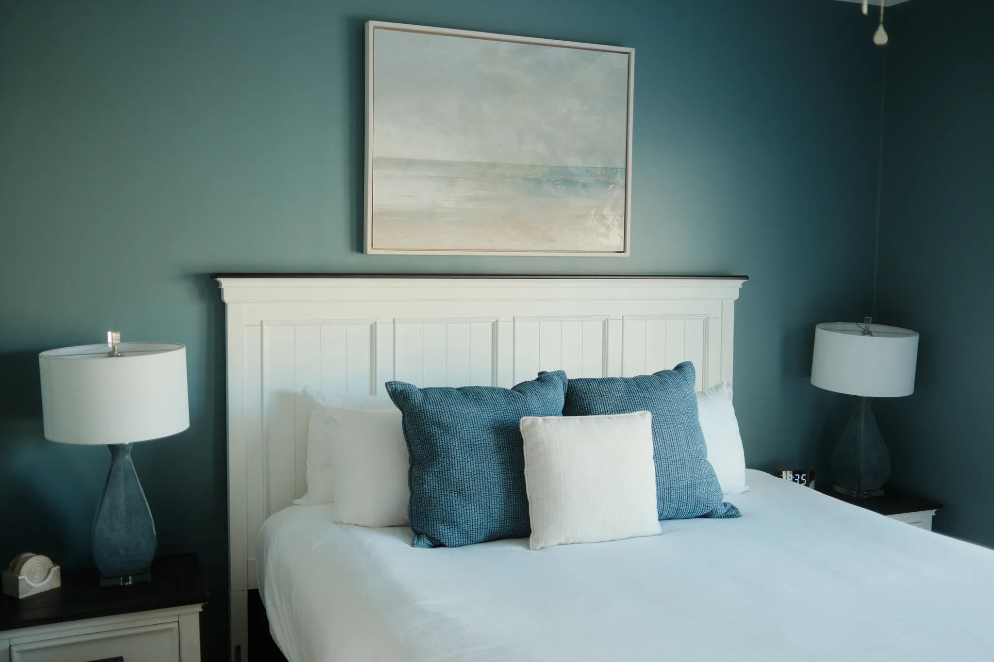 image Calming hues and cozy textures create a serene bedroom designed for deep rest and quiet mornings.