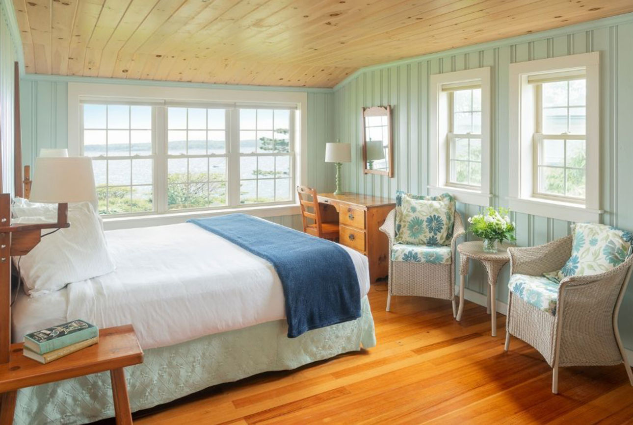 image Wake up to dappled light and ocean whispers in a bright retreat where comfort meets classic seaside charm.