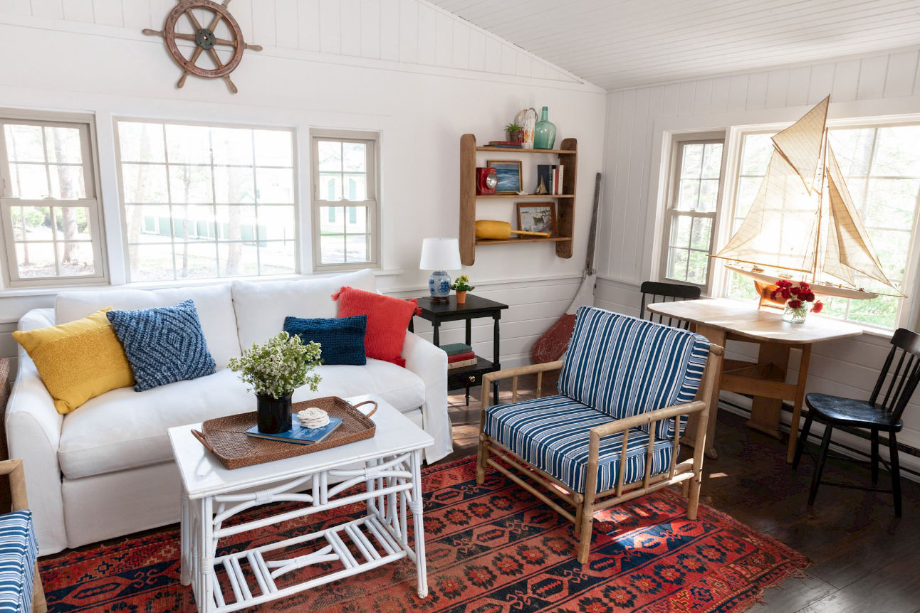 image Cheerful hues and nautical touches create a welcoming retreat made for lingering with good books and better company.