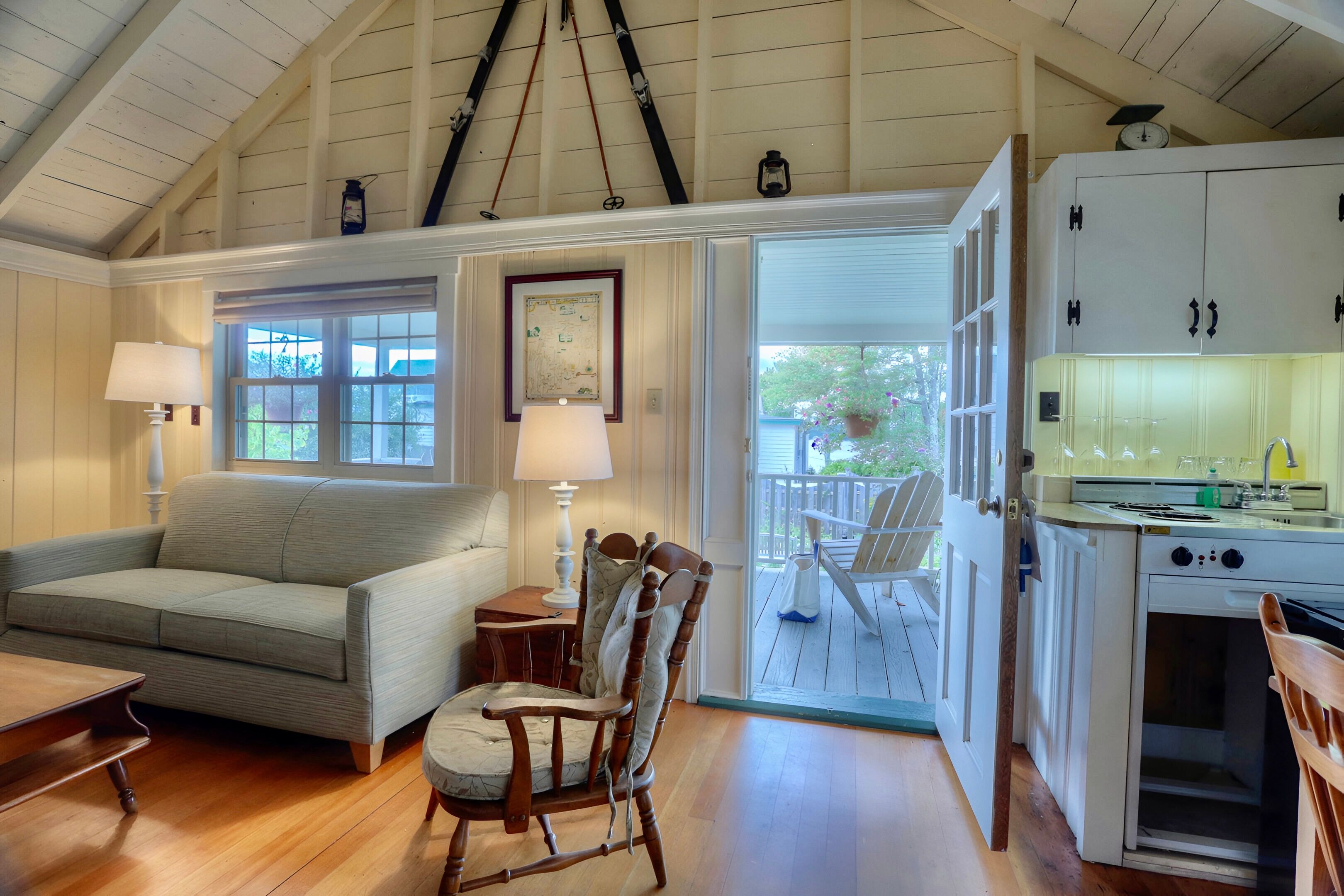 image Open doors, soft light, and quiet charm create the perfect setting to unwind after a day by the bay.