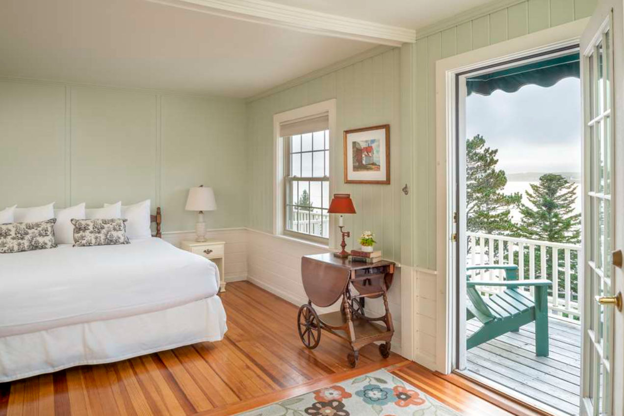 image Step into a light-filled retreat where soft hues, ocean air, and cottage charm create the perfect coastal escape.