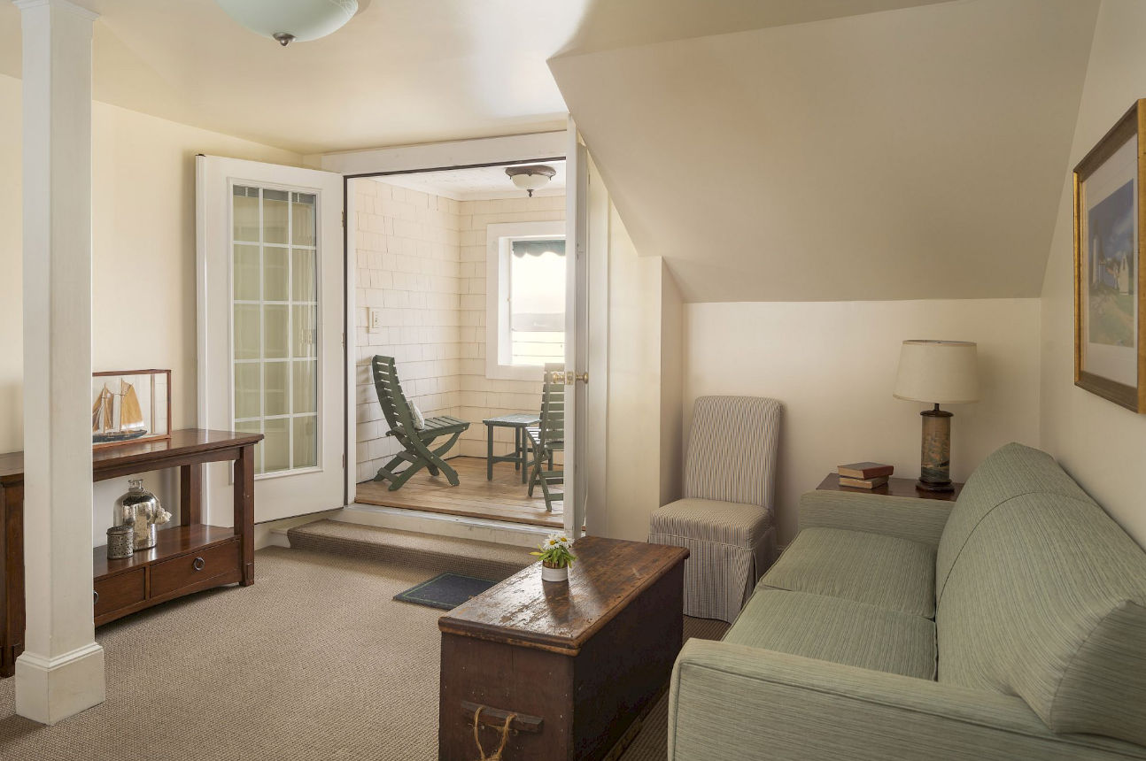 image Relax in a spacious sitting room where soft tones, natural light, and quiet comfort offer a peaceful pause between adventures.