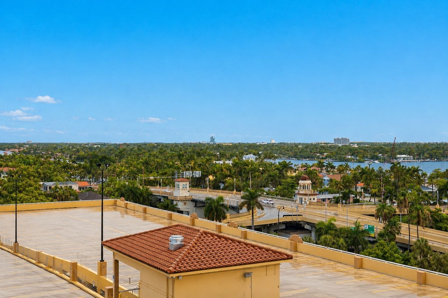 image View of greenery, buildings, and blue sky