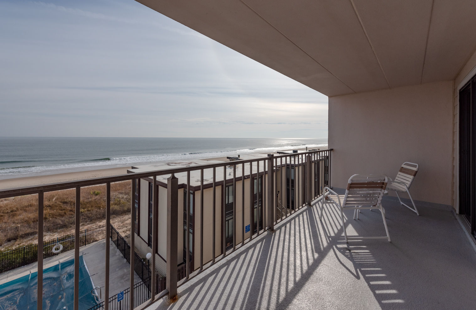 image Enjoy the views from the private balcony, perfect for morning coffee or evening sunsets. Please note that the view may vary.
