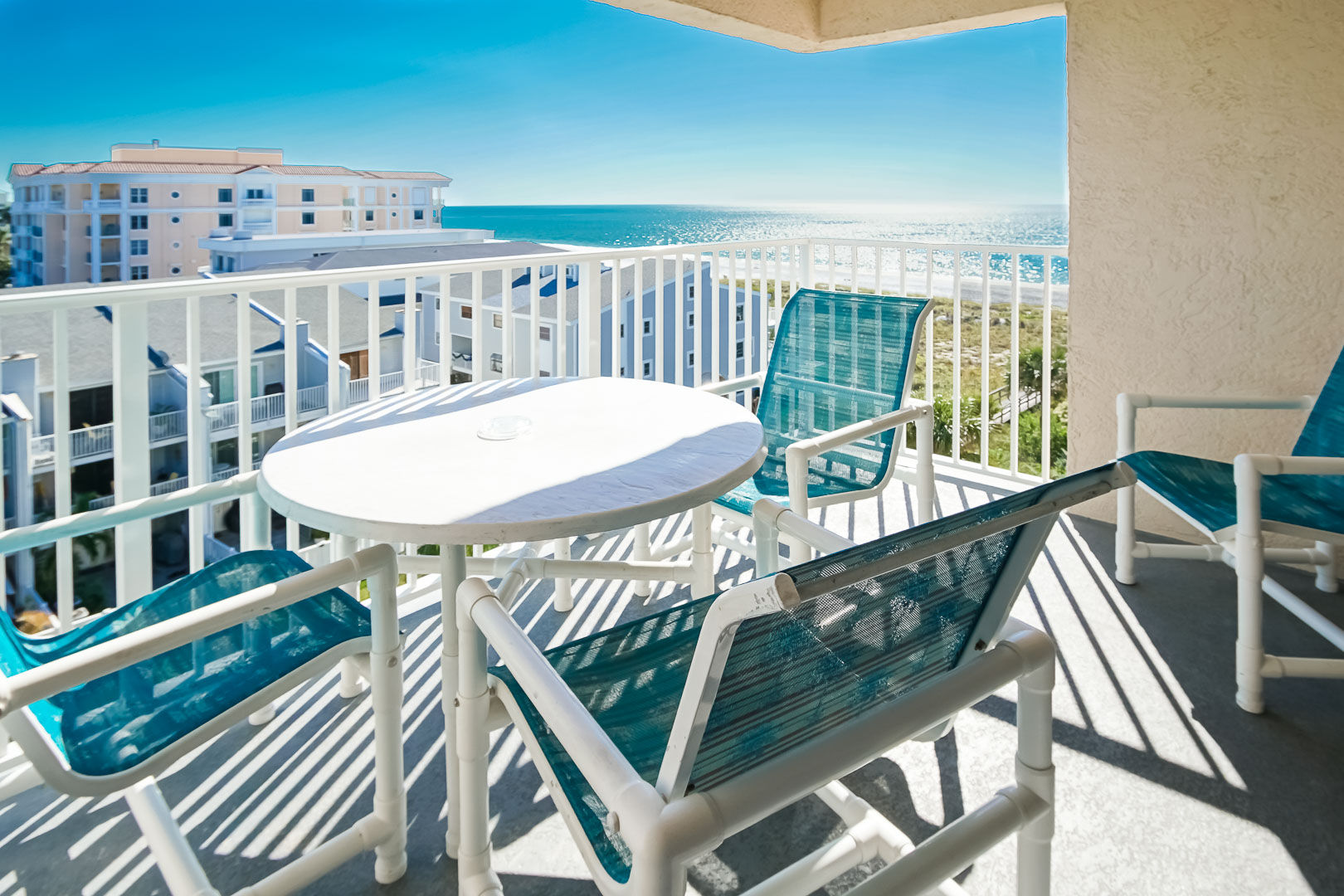image Enjoy breathtaking ocean views and relaxing moments on your private balcony at Sand Pebble, Treasure Island, FL.