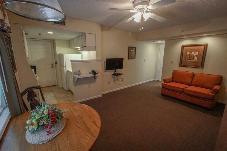 image Experience beachside serenity in this cozy studio featuring a welcoming layout, perfect for relaxing after a day in the sun at Sand Pebble, Treasure Island.