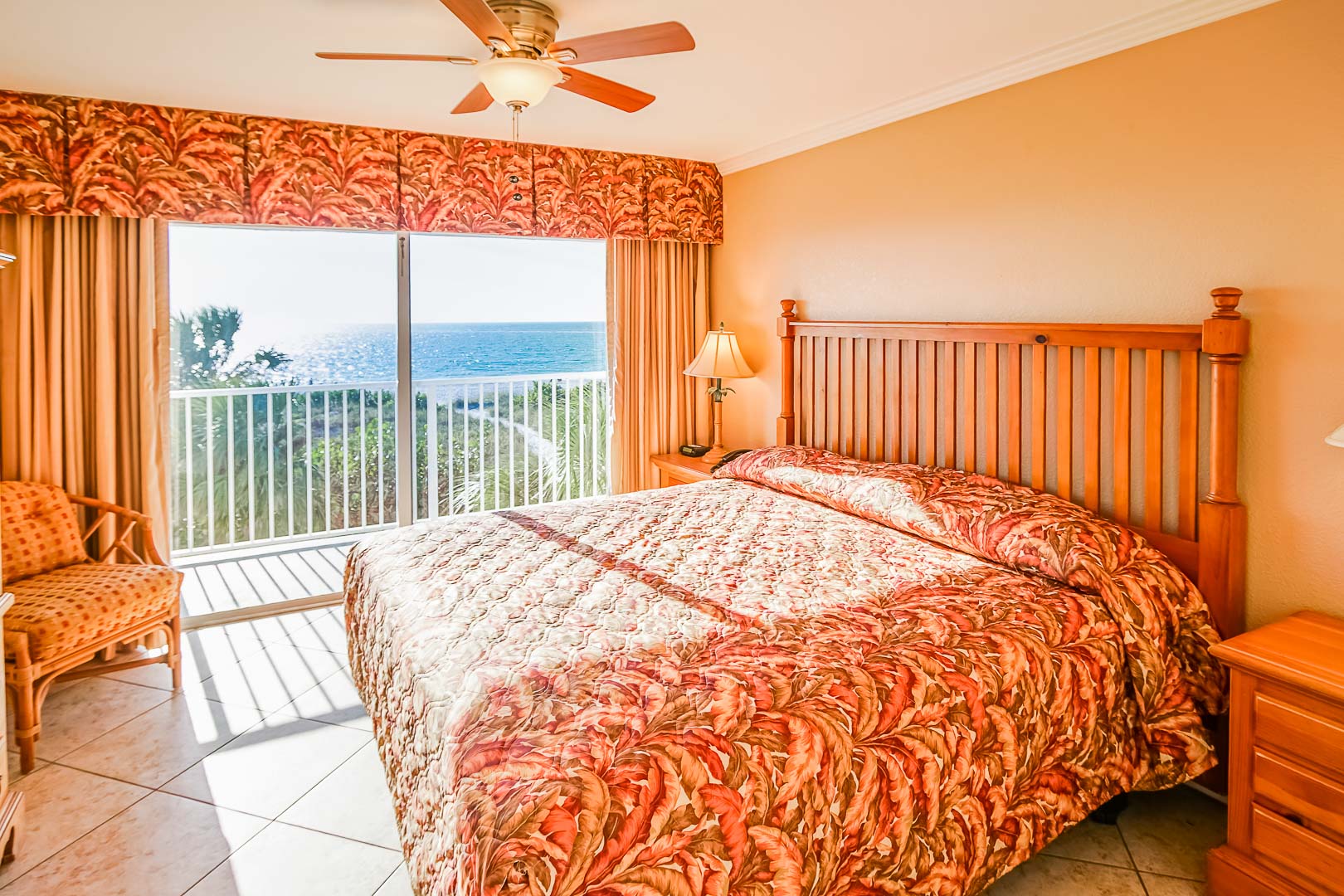image Rest easy in a spacious bedroom featuring a comfortable king bed and picturesque sea views right from your window.