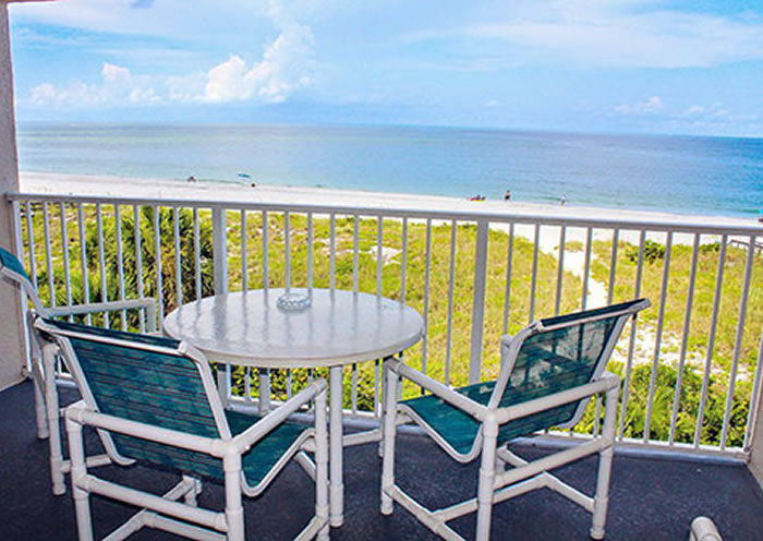 image Enjoy stunning sunsets and gentle ocean breezes from your private beachfront balcony, perfect for morning coffee or evening relaxation.
