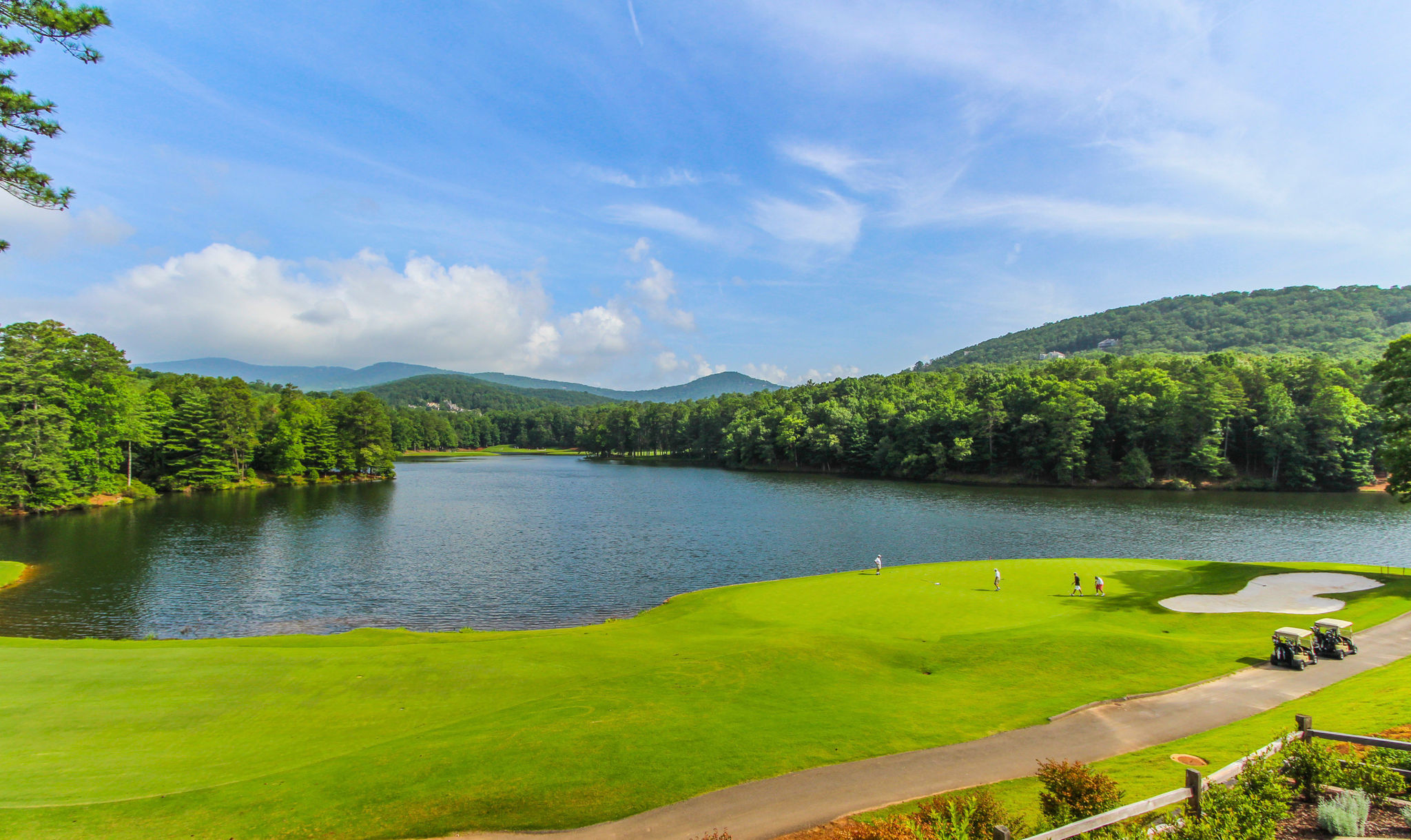 image Just minutes away, golf enthusiasts can indulge in a round on beautiful local courses set against stunning landscapes.