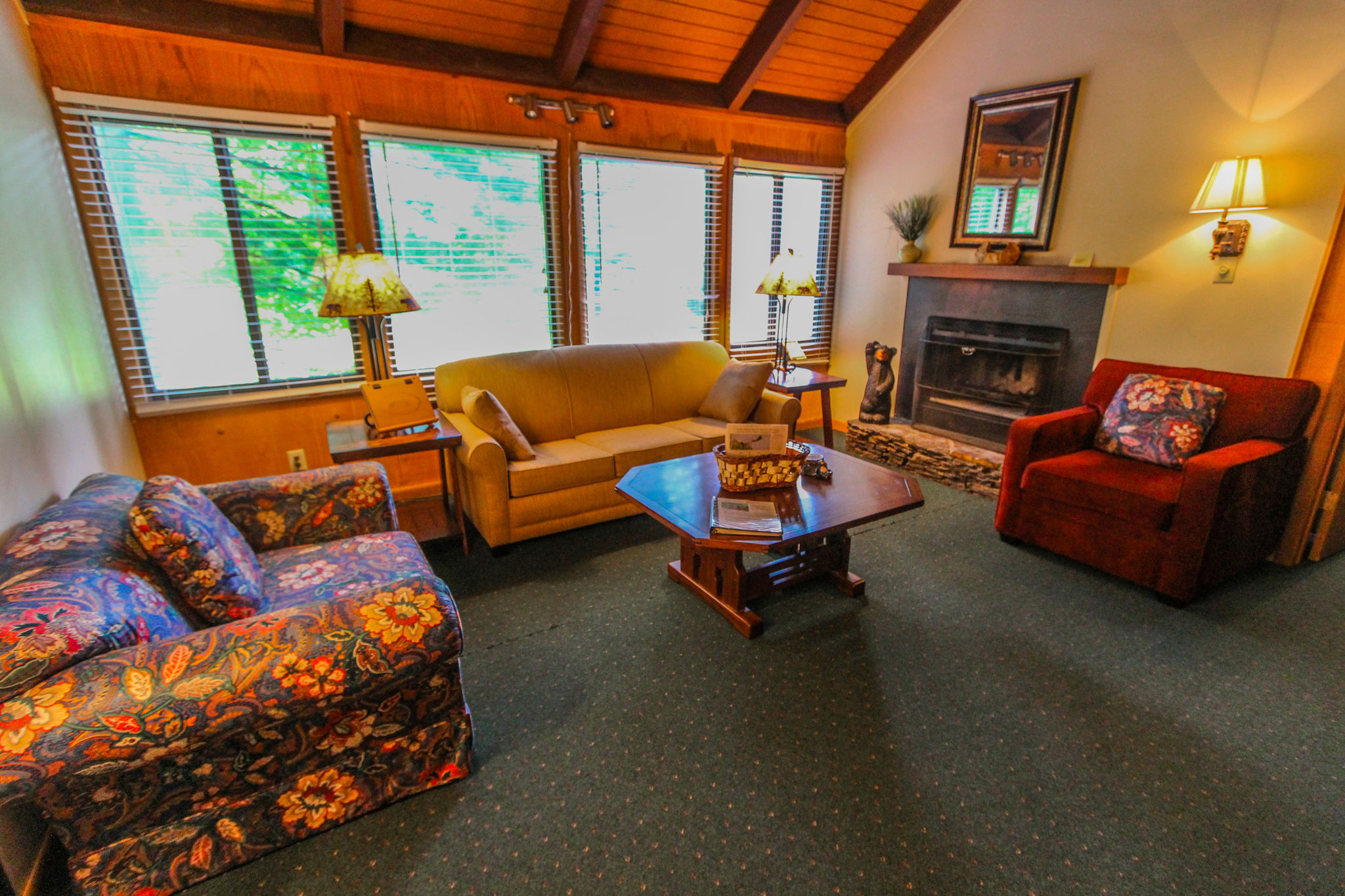image With beautiful furnishings, this living area includes a fireplace and ample seating, ideal for family evenings after a day of exploring nearby mountains and golf.