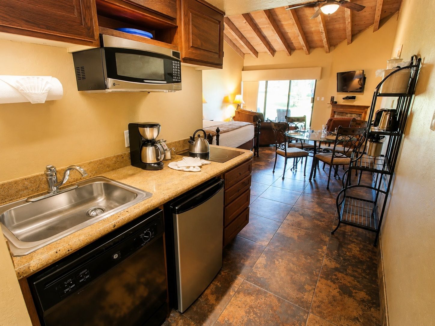 image Ignite your culinary creativity in a well-equipped kitchenette, perfect for whipping up breakfast or brewing your favorite coffee before exploring the beauty of Sedona.