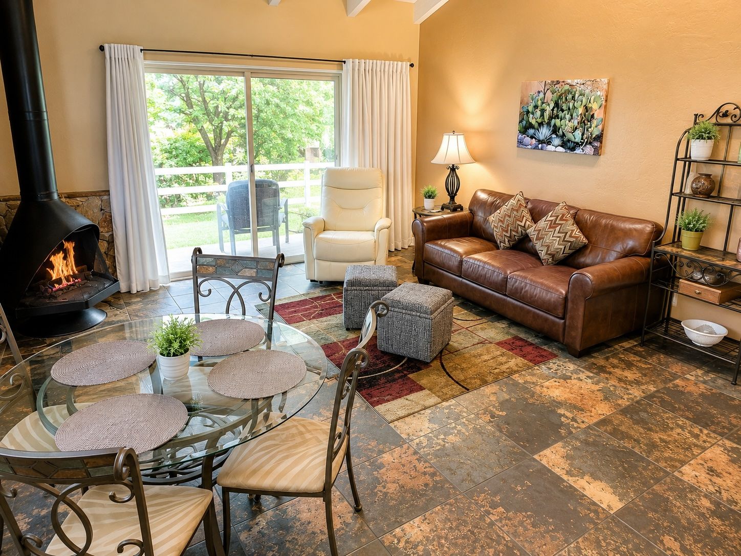 image Enjoy intimate family gatherings in a spacious living area complete with a gas fireplace and a dining space, ideal for creating lasting memories.