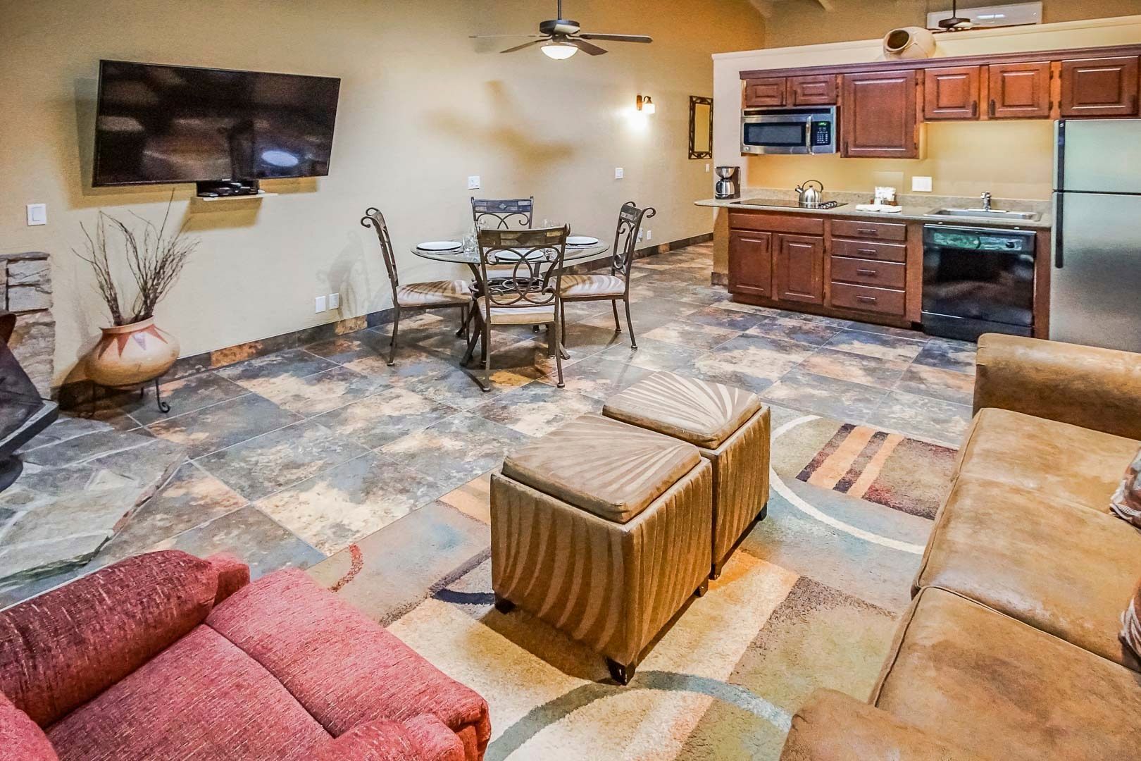 image An inviting interior featuring a cozy living space and partial kitchen, ideal for relaxation and family gatherings after a day of exploring Sedona.