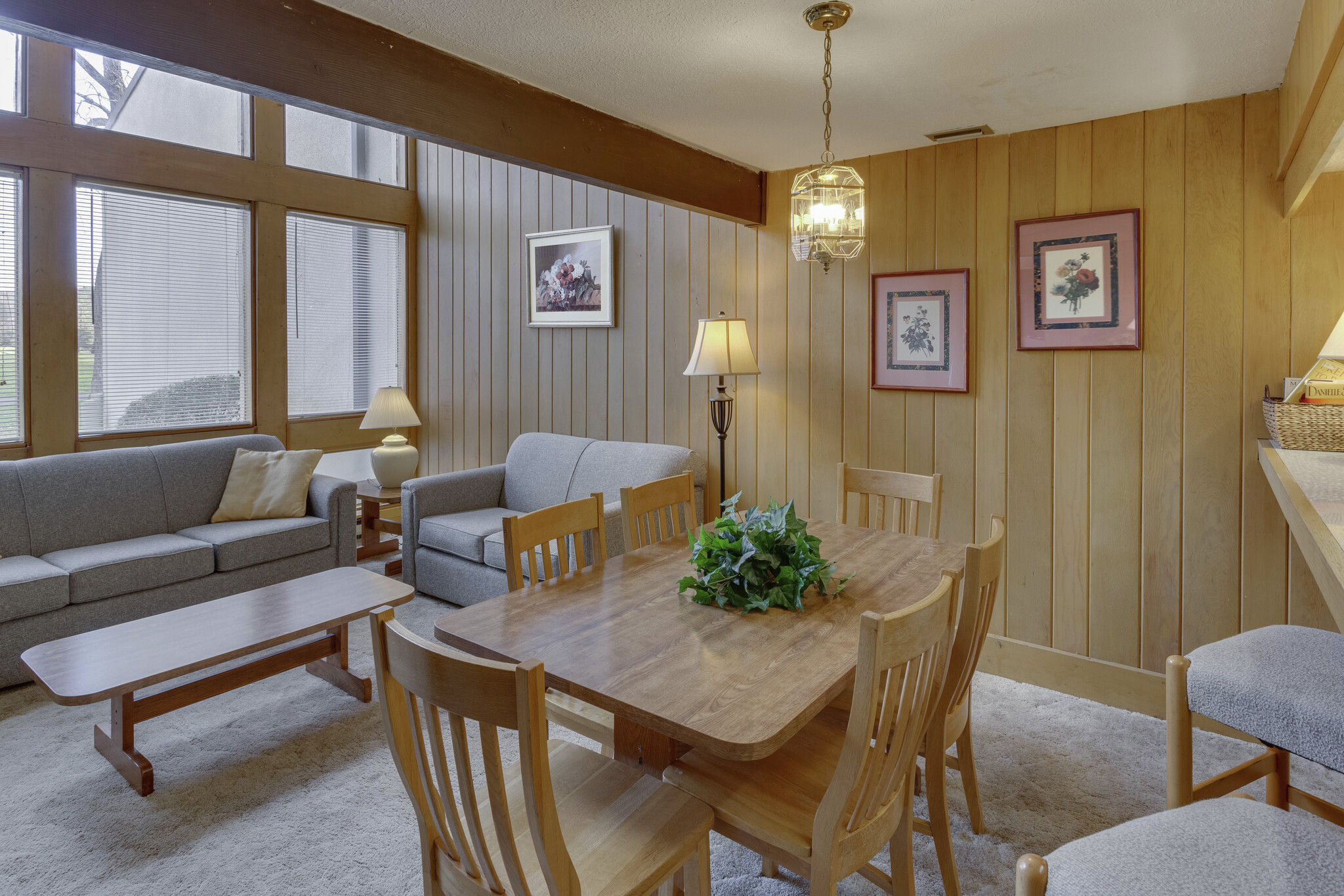 image The comfortable living and dining area is perfect for family gatherings, featuring a smart TV, WiFi, and a fireplace to keep warm and cozy.