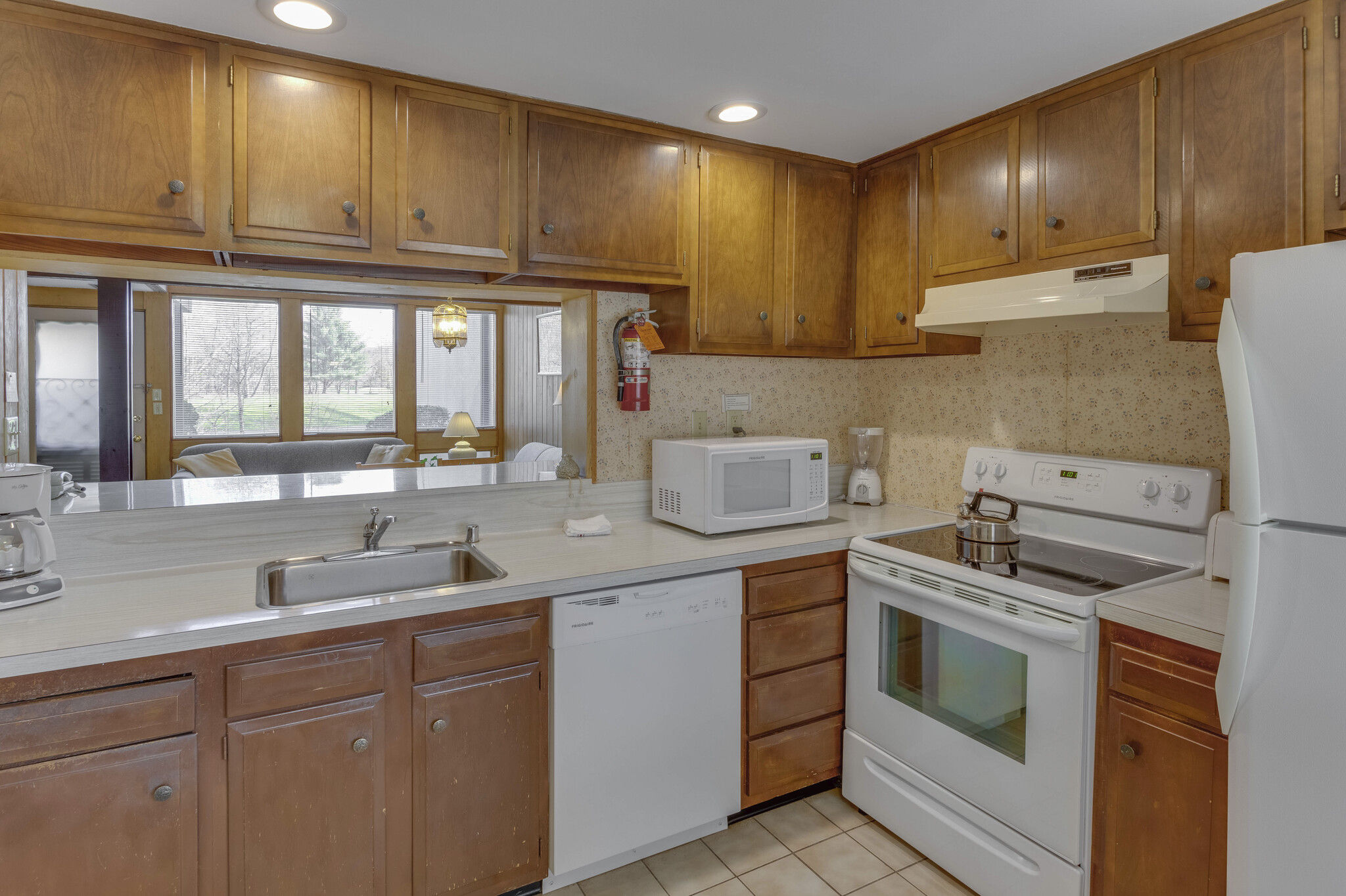 image Cook delicious meals in the fully equipped kitchen, designed for convenience with modern appliances and ample counter space.