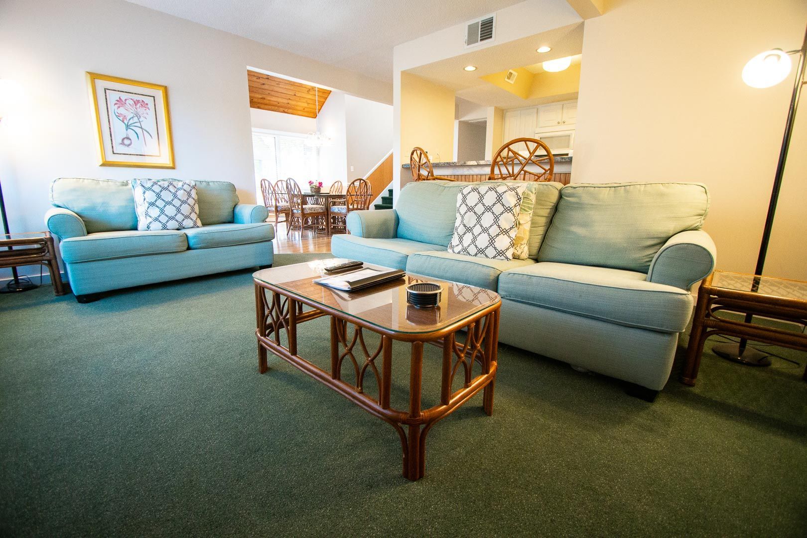 image Experience comfort in this spacious Sandcastle Village II townhouse, featuring a cozy living area with plush seating and a welcoming atmosphere ideal for family gatherings.