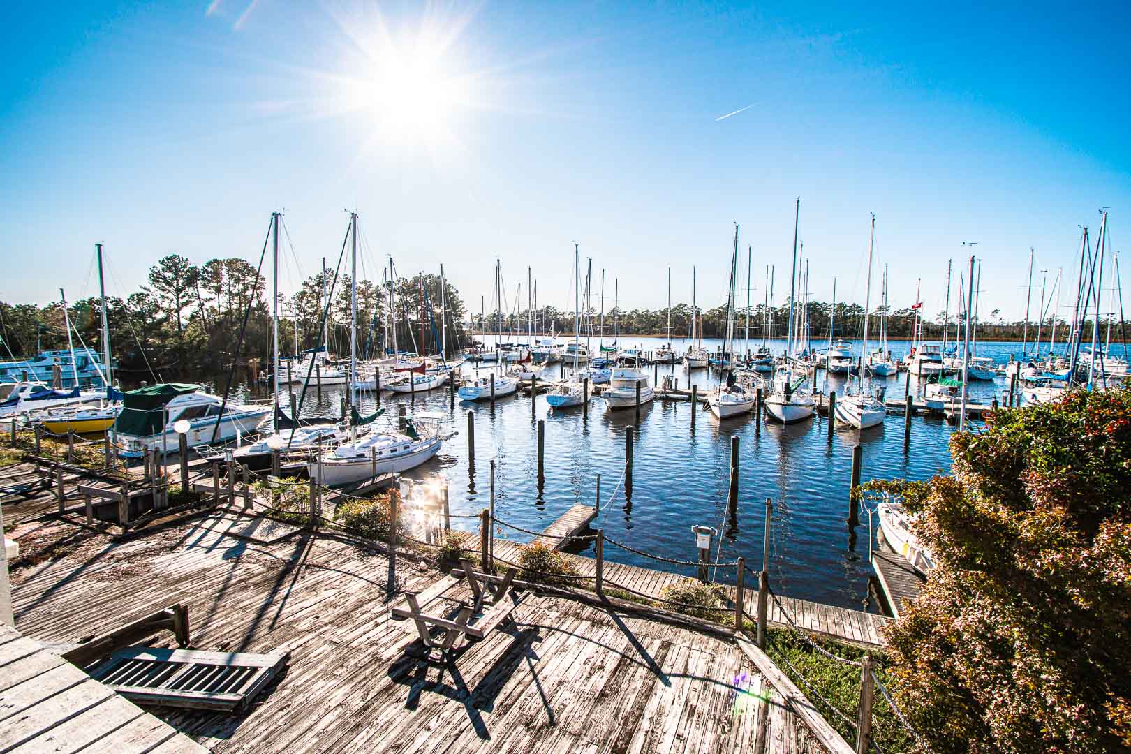 image Enjoy serene riverfront views filled with sailboats, ideal for a peaceful afternoon with the family or exploring local waterfront activities.