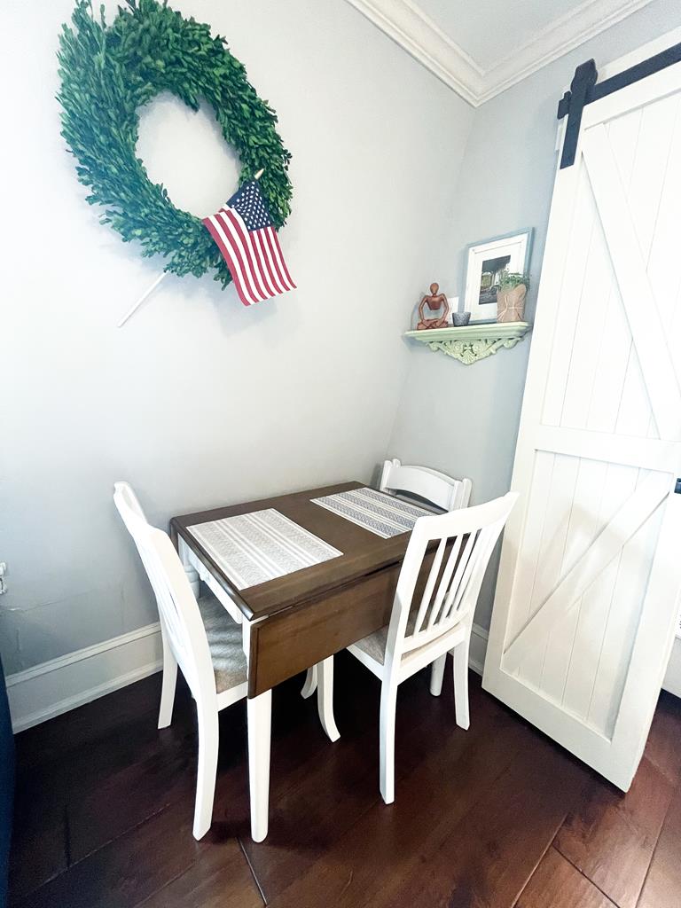 image This cozy dining nook is ideal for enjoying meals in a relaxed atmosphere.