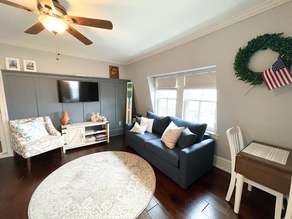 image Step into a cozy living space with inviting decor, perfect for relaxing after a day at the beach.